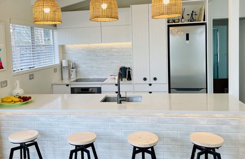 Waikanae House | Coastal Style with Sea Views and a Hot Tub