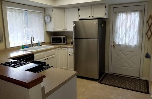 Coeur d'Alene House | Coeur d'Alene's Famous Lakeshore Cottage close to the beach!