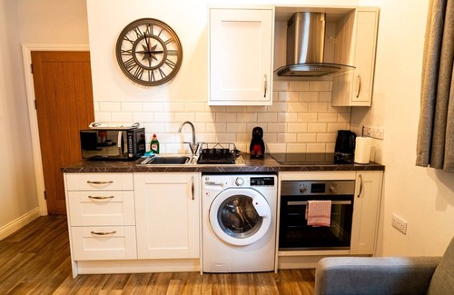 Castle Apartment | Cohost Partners Serene Chapel Retreat King Bed Sleeps 4