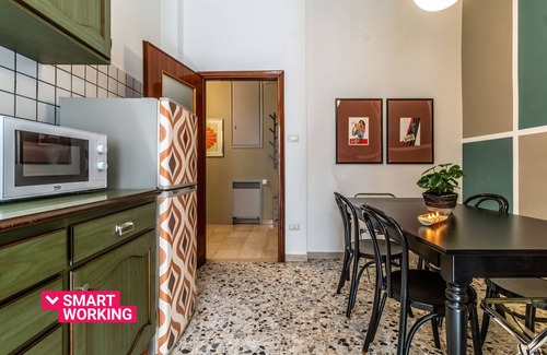 Historic Center Apartment | Colorful apartment in Riva di Reno by Wonderful Italy