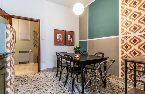 Historic Center Apartment | Colorful apartment in Riva di Reno by Wonderful Italy