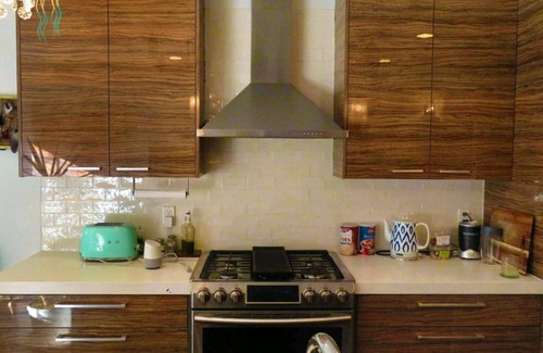 Bushwick House | Colorful Townhouse Duplex with outdoor space.