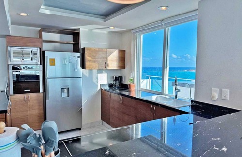 Zona Hotelera Condo | Combo #324-Tim’s Ocean Condos – Beachfront with two Private Spacious Terraces!