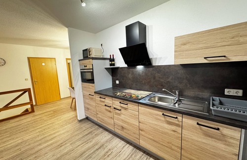 Eibenstock Apartment | Comfortable 72m² loft apartment near the bathing gardens and sauna complex.