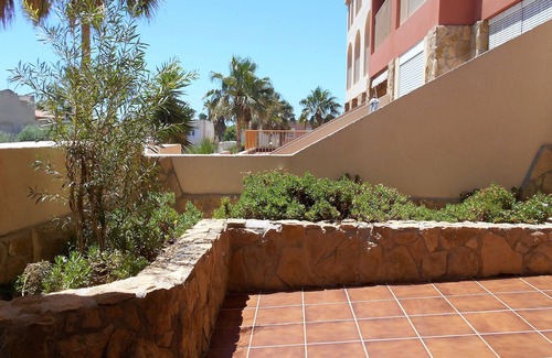 Almerimar Apartment | Comfortable apartment in residence with swimming pool, children's playground