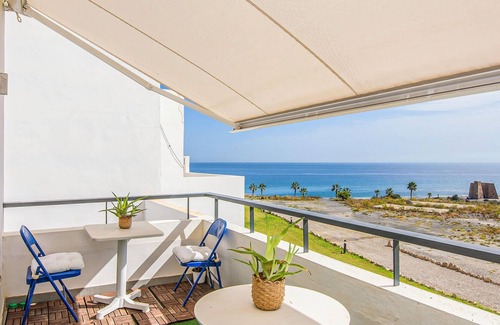 Playa Macenas Apartment | Comfortable apartment with shared pool and sea view.
