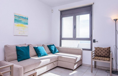 Playa Macenas Apartment | Comfortable apartment with shared pool and sea view.