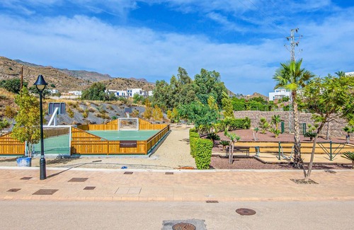 Playa Macenas Apartment | Comfortable apartment with shared pool and sea view.