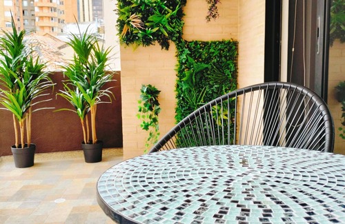 Centro International Apartment | Comfortable apartment with private terrace. Bogota International Center.