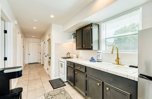 San Jacinto House | Comfortable duplex with large 2nd floor deck, W/D, central AC-1 block from beach