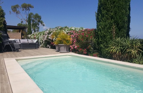 Oletta Apartment | Comfortable ground-floor apartment with pool access for two adults