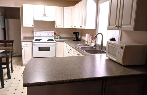Broadmead House | Comfortable ground level suite with large yard access.