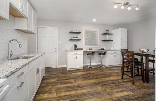 Rock Hill House | Comfortable ranch home with an art gallery vibe, updated kitchen and 55-inch smart TV.