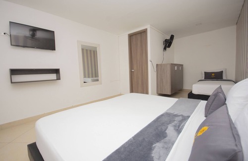 Bello Hotel | Comfortable room for 3 people in Bello