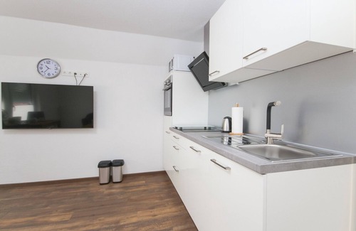 Norddeich Apartment | Comfortable vacation apartment Kranich 2 with balcony in Norddeich, close to the sea