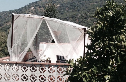 Benamahoma Villa | Comfortable village house with swimming pool and walled garden