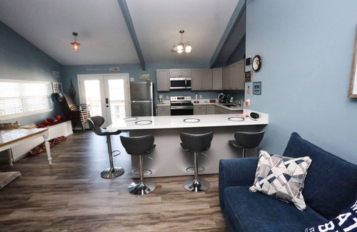 Jamaica Beach House | Comfy Canal Home 2 Min Dr to Beach + Outdoor Space/Fishing!