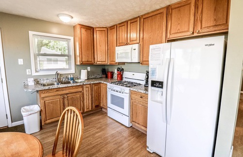 Traverse City Cottage | Comfy Cottage with Shared Waterfront on Silver Lake