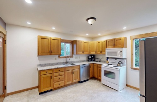 Newport House | Comfy duplex with peekaboo ocean views, private hot tub, & easy beach access