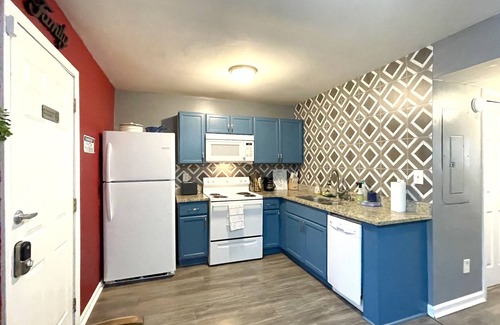West End House | Comfy Luxe Villa Downtown with Custom Mural