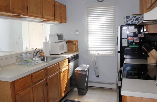 Brewster Condo | Completely remodeled end unit!