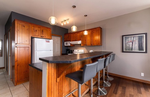 Petite-Riviere-Saint-Francois Condo | Condo 120B: Spacious, Spa, River Views
