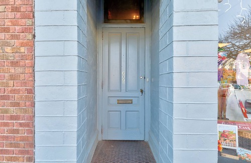 Pella Apartment | Condo in Pella- Steps to Shops, Bakeries, and Iconic Windmill!