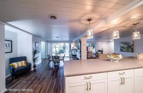 Detroit Lakes Condo | Condo with Lakefront View. 2 Bedroom, Large entertaining space with Dock /Slip!