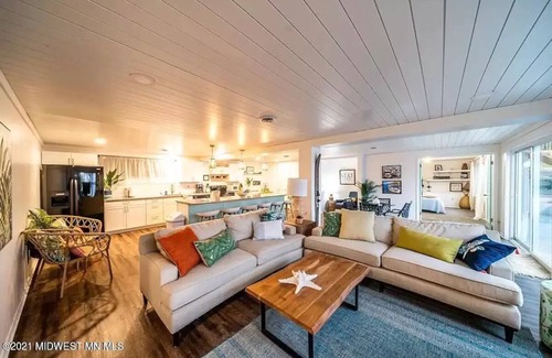 Detroit Lakes Condo | Condo with Lakefront View. 2 Bedroom, Large entertaining space with Dock /Slip!