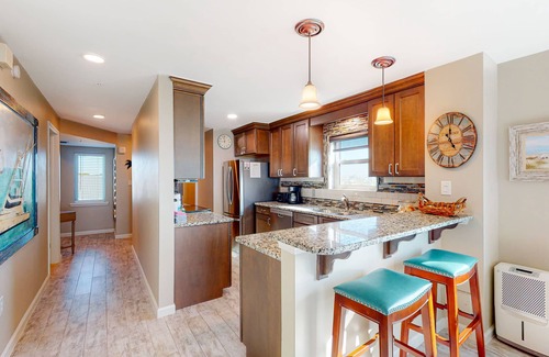Fort Walton Beach Condo | Condo with sweeping panoramic views of the Gulf, two beach chairs & umbrella