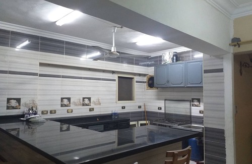 Qasr an-Nil Apartment | condoCozy Furnitured Apartment Downtown Cairo offers accommodation in Cairo, 1.1 km from Tahrir Square and 1.2 km from Ibn Tulun Mosque. The property is 1.5 km from The Egyptian Museum