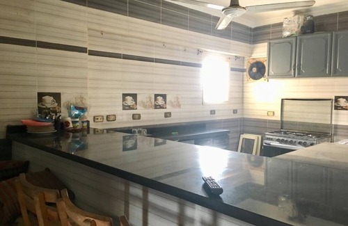 Qasr an-Nil Apartment | condoCozy Furnitured Apartment Downtown Cairo offers accommodation in Cairo, 1.1 km from Tahrir Square and 1.2 km from Ibn Tulun Mosque. The property is 1.5 km from The Egyptian Museum