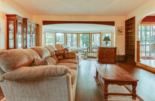 Lochmere House | Contemporary pet-friendly waterfront home on Silver Lake with lovely sunroom