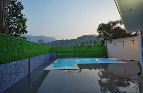 Devikolam Bed & Breakfast | Cool Nest 5 BR Pool Villa Munnar by VOYE HOMES