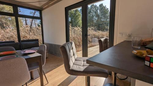 Castelldefels House | CoolTainer retreat Sustainable Coastal forest Tiny house near Barcelona by QuirkyGetaway