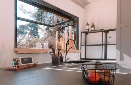 Castelldefels House | CoolTainer retreat Sustainable Coastal forest Tiny house near Barcelona by QuirkyGetaway