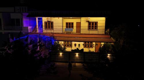 Kushalnagar House | Coorg peacock feathers home stay