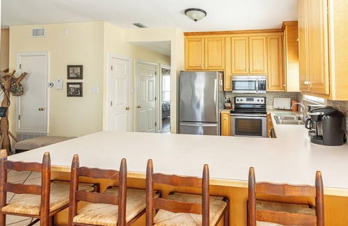 Morgantown House | Coral Reef East is a 4 bedrooms and 3 bath unit in wonderful Morgantown Sub-Division with access to pools and tennis courts. This home will accommodate up to 12 people. Please note that this home only rents for the summer.May 21 to August 19.