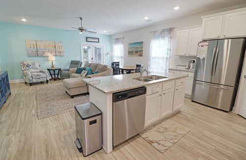 Port St. Joe House | "CORAL SUNSETS" IS A 4BD W/MOTHER-IN-LAW SUITE! OPTION TO RENT GOLF CART, PET FRIENDLY!