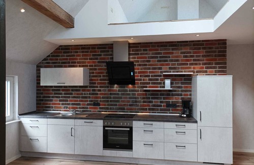 Dornum Condo | Core-serviced apartment directly on the small dike for up to 4 people
