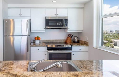 Coconut Grove Apartment | Corner Apartment, Wrap-around Balcony Facing the Sea. FREE Parking, Pool, Gym