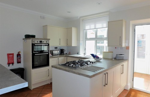 Sheringham House | Corner House - a house that sleeps 8 guests in 4 bedrooms