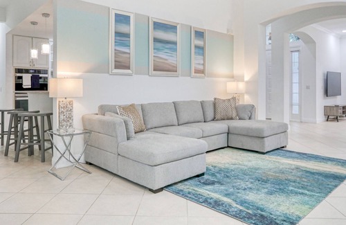 Ridgewood Lakes House | Corner lot home with screened pool + spa, game room, on-site golf, AC, & WiFi
