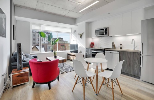 Wellington Village Apartment | Corporate Stays - Modern 1BR Loft with Spacious Layout and Style