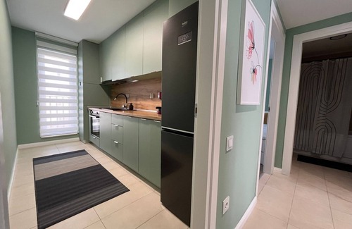 Stefanestii de Jos Apartment | Cosmopolis Family Apartment - Pools & Gym