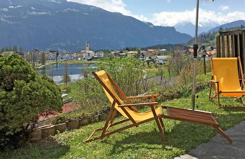 Laax Apartment | Cosy apartment for 2 people with WIFI, TV, terrace, pets allowed, panoramic view and parking