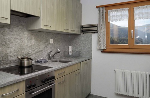 Frauenkirch Apartment | Cosy apartment for 3 guests with WIFI, TV, terrace, panoramic view and parking