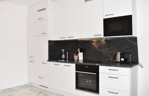 Bigogno Apartment | Cosy apartment for 4 guests with A/C, WIFI, pool, TV, balcony, panoramic view and parking