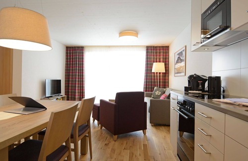 Tavanasa Apartment | Cosy apartment for 4 guests with pool, WIFI, hot tub, TV, patio, panoramic view and parking