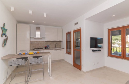 Porto Istana Apartment | Cosy apartment for 4 people with WIFI, A/C, pool, TV, terrace and parking